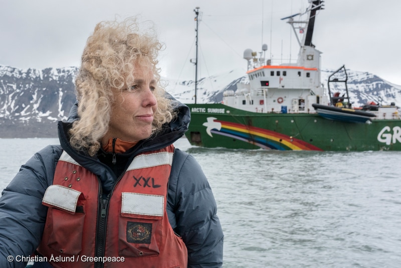 Greenpeace International Executive Director Jennifer Morgan sails with the Arctic Sunrise on Svalbard, in the high Arctic.